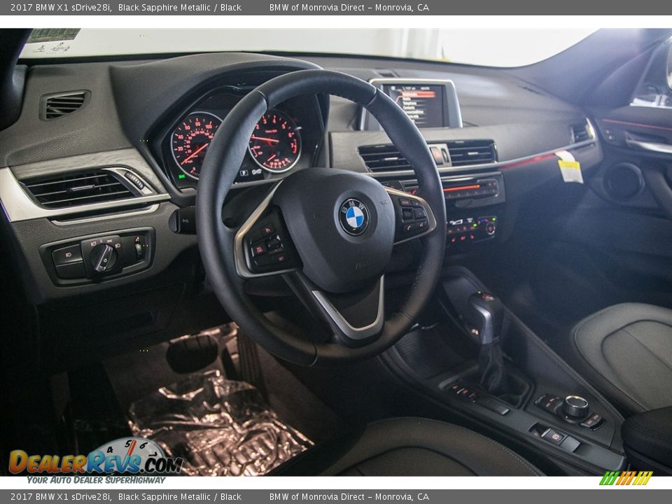Dashboard of 2017 BMW X1 sDrive28i Photo #6