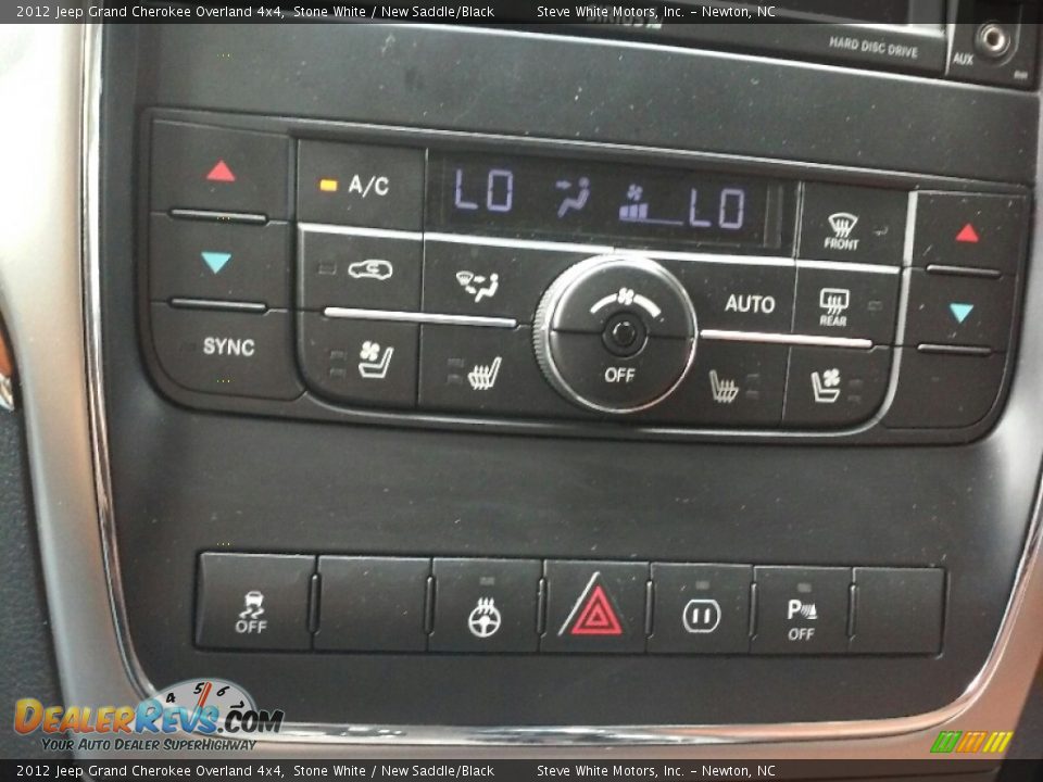 2012 Jeep Grand Cherokee Overland 4x4 Stone White / New Saddle/Black Photo #21