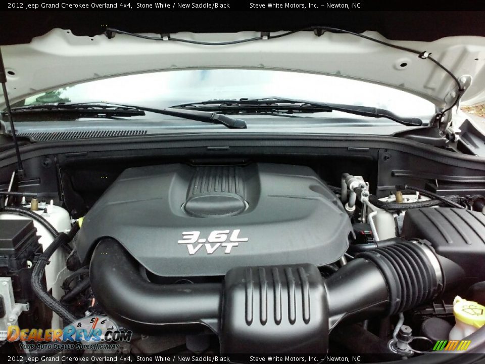 2012 Jeep Grand Cherokee Overland 4x4 Stone White / New Saddle/Black Photo #27