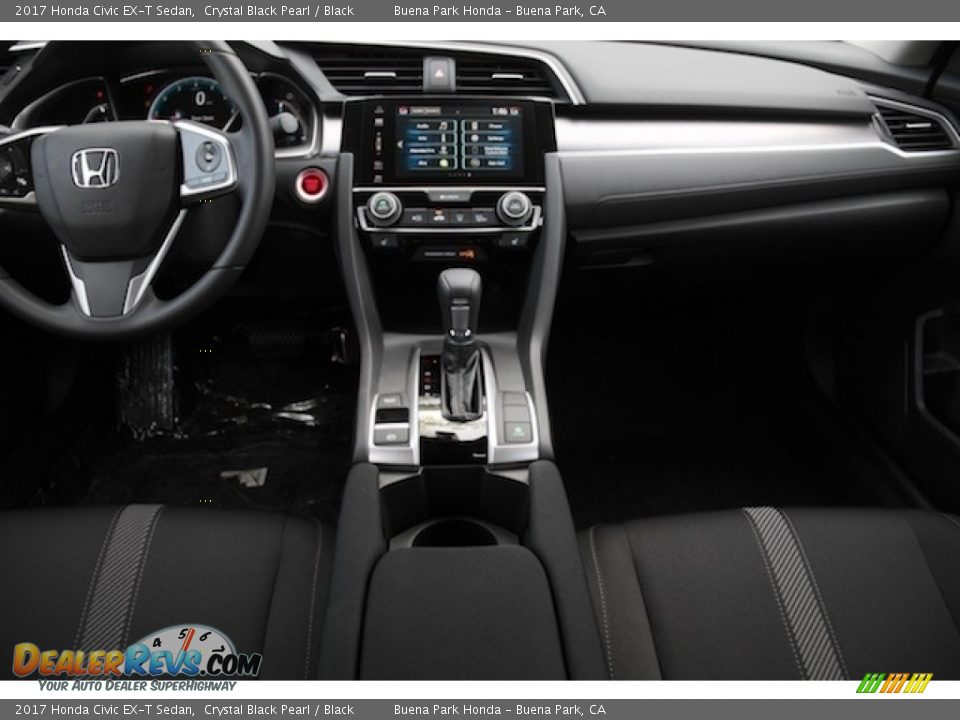 Dashboard of 2017 Honda Civic EX-T Sedan Photo #13