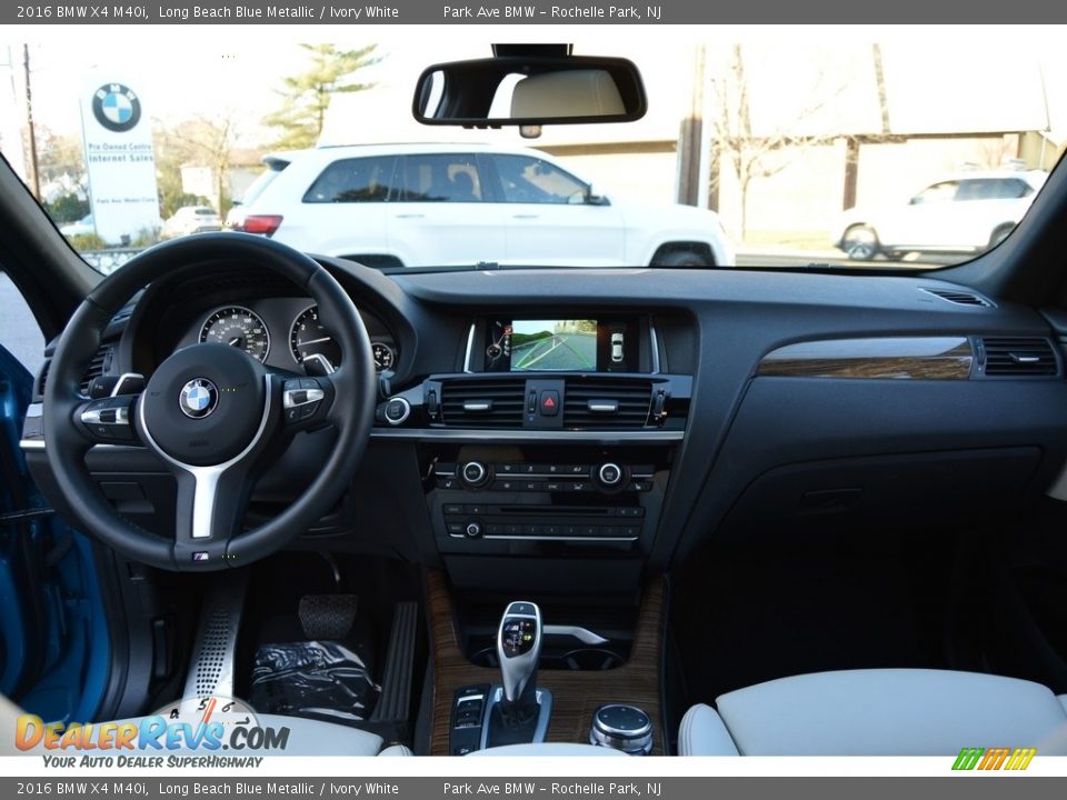 Dashboard of 2016 BMW X4 M40i Photo #15