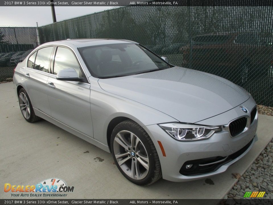 Front 3/4 View of 2017 BMW 3 Series 330i xDrive Sedan Photo #5