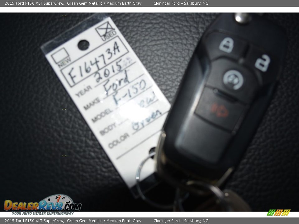 2015 Ford F150 XLT SuperCrew Green Gem Metallic / Medium Earth Gray Photo #28