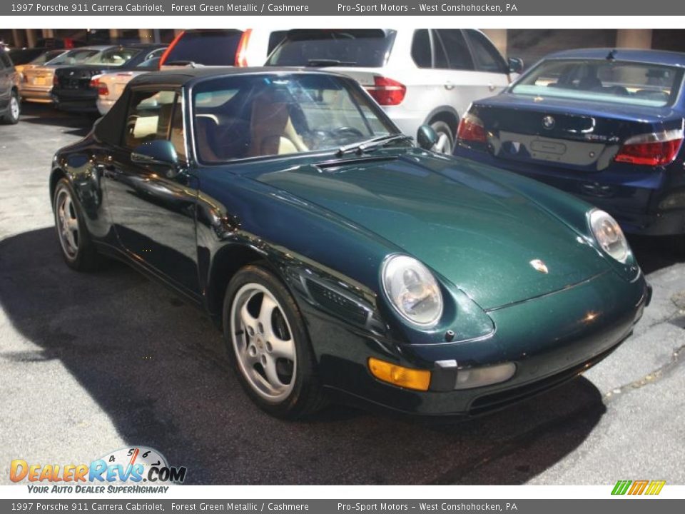 Front 3/4 View of 1997 Porsche 911 Carrera Cabriolet Photo #3