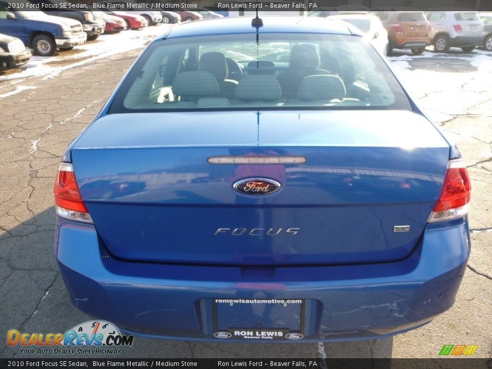 2010 Ford Focus SE Sedan Blue Flame Metallic / Medium Stone Photo #5