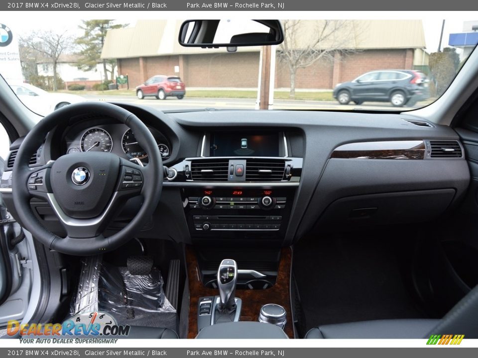 Dashboard of 2017 BMW X4 xDrive28i Photo #15