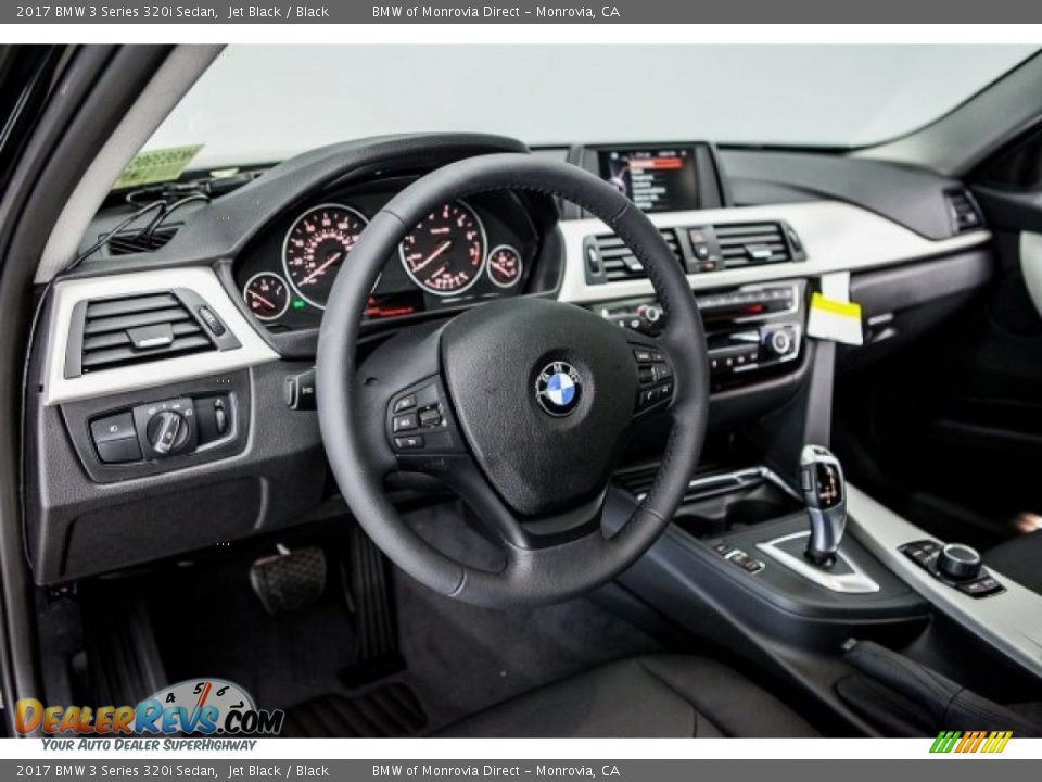 Dashboard of 2017 BMW 3 Series 320i Sedan Photo #6