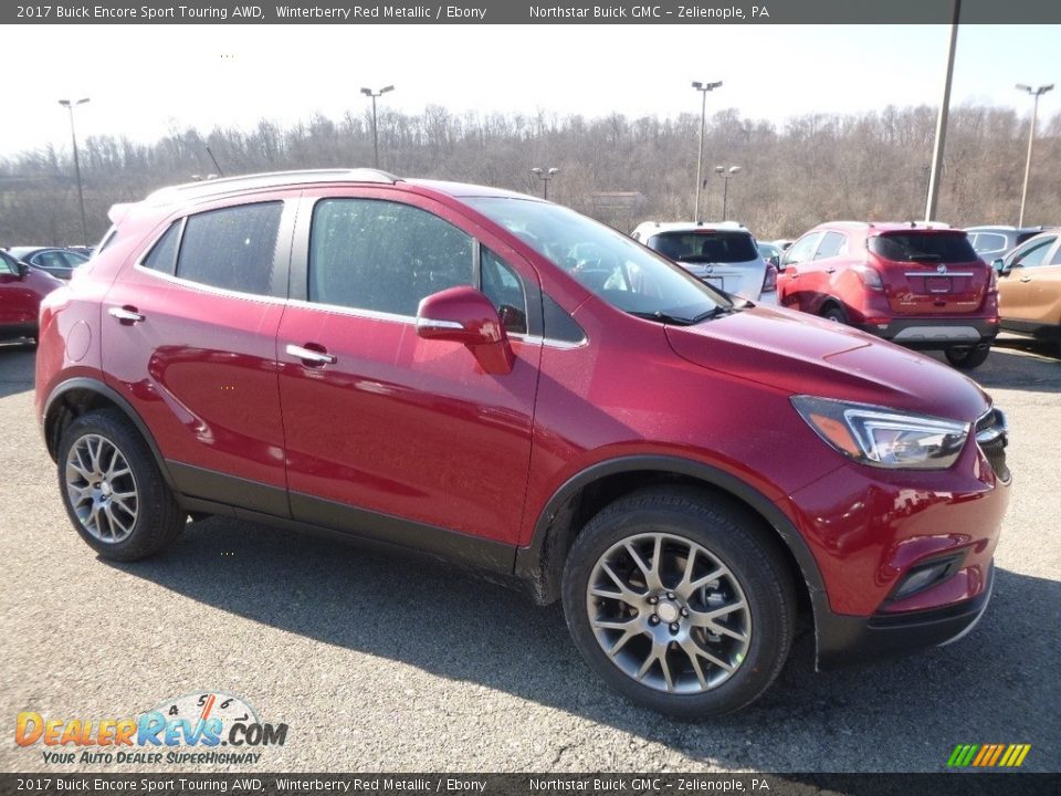 Front 3/4 View of 2017 Buick Encore Sport Touring AWD Photo #3