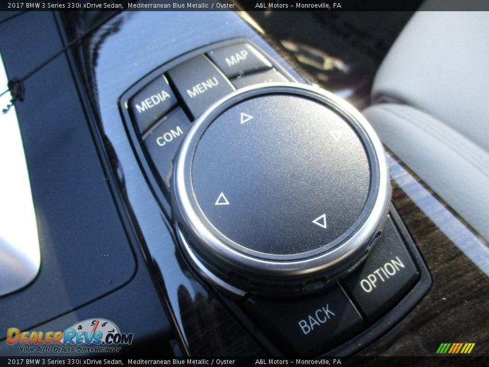 Controls of 2017 BMW 3 Series 330i xDrive Sedan Photo #18