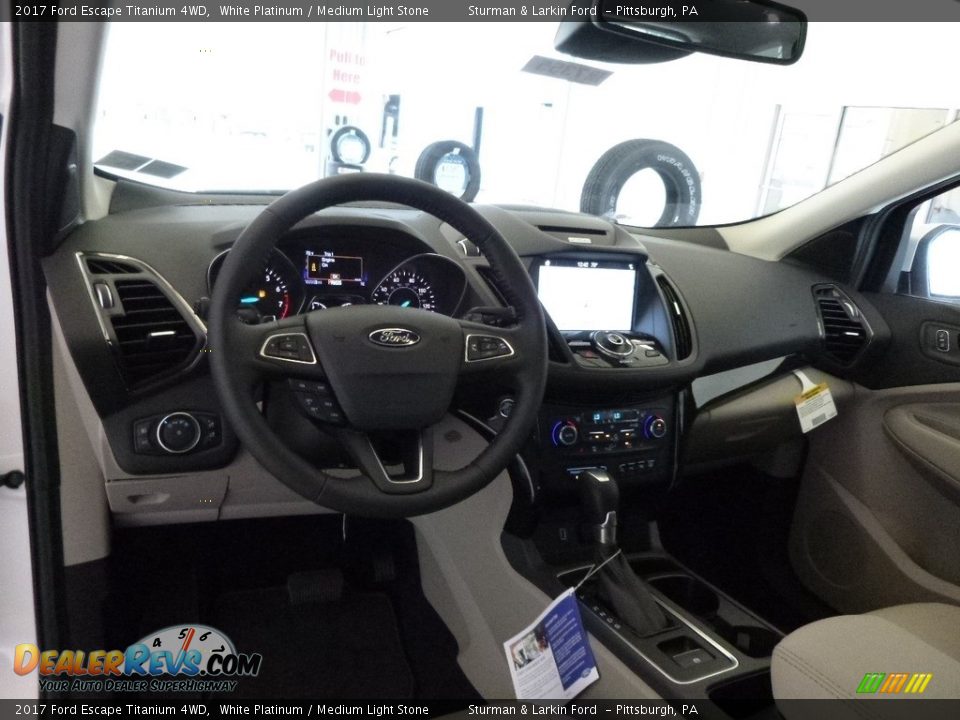 Dashboard of 2017 Ford Escape Titanium 4WD Photo #9