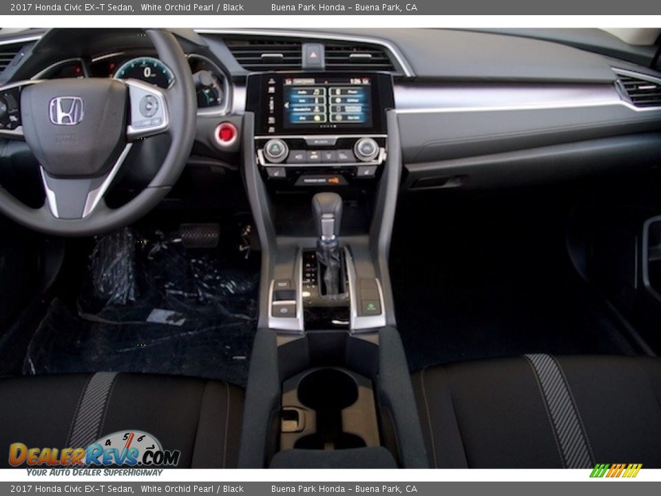 Dashboard of 2017 Honda Civic EX-T Sedan Photo #13