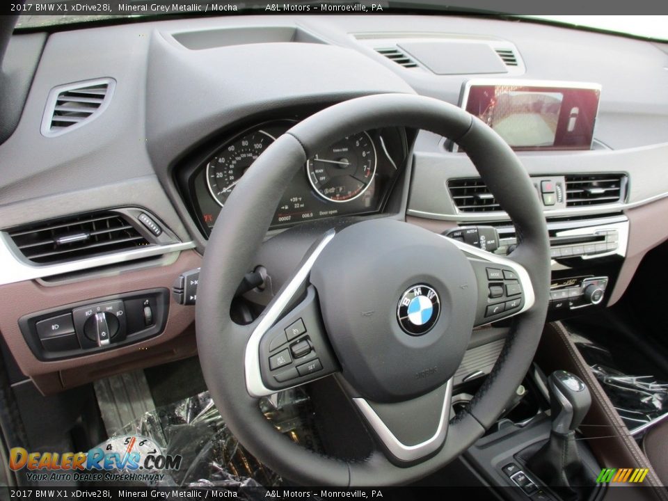 Dashboard of 2017 BMW X1 xDrive28i Photo #14