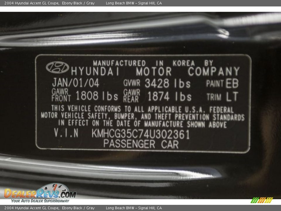 2004 Hyundai Accent GL Coupe Ebony Black / Gray Photo #17