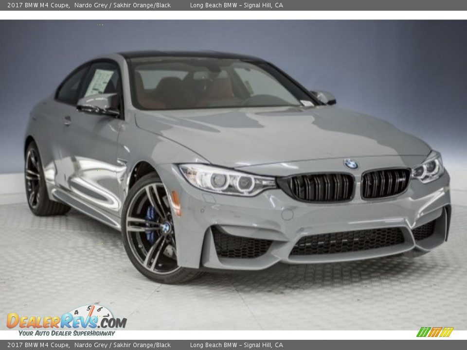 Front 3/4 View of 2017 BMW M4 Coupe Photo #11