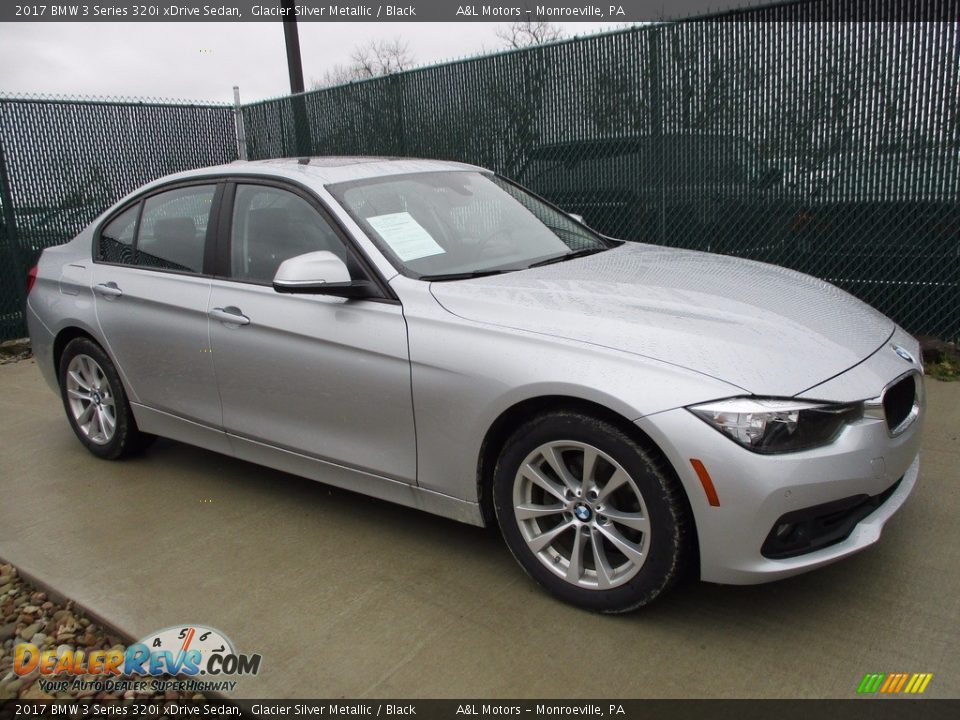 Front 3/4 View of 2017 BMW 3 Series 320i xDrive Sedan Photo #1