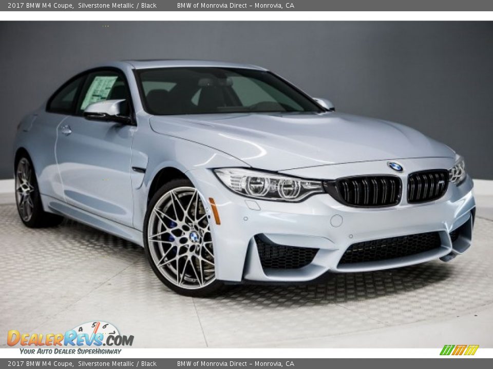 Front 3/4 View of 2017 BMW M4 Coupe Photo #12