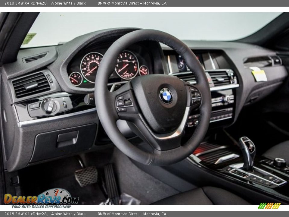 Dashboard of 2018 BMW X4 xDrive28i Photo #5