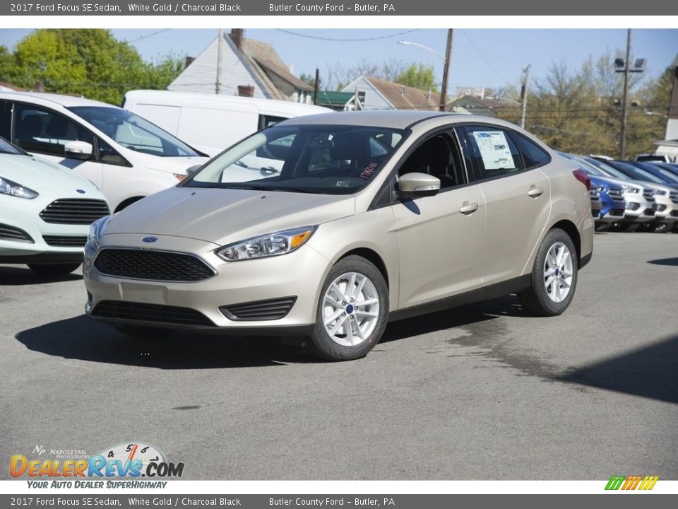 2017 Ford Focus SE Sedan White Gold / Charcoal Black Photo #1