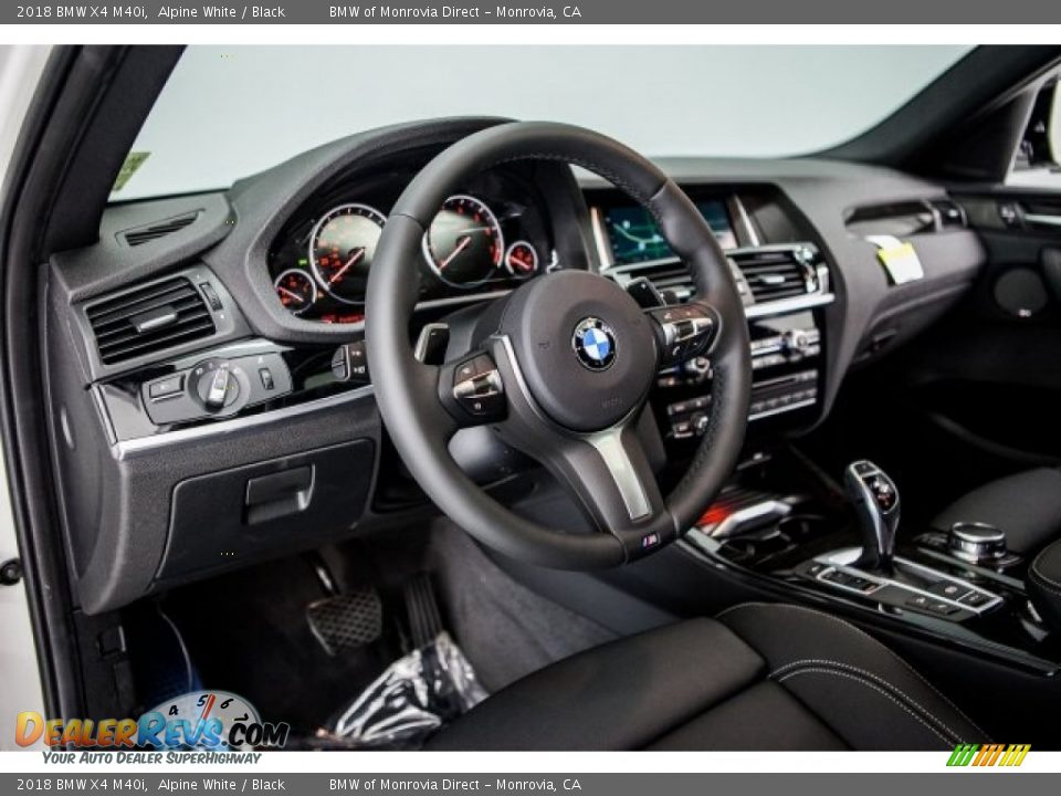 Dashboard of 2018 BMW X4 M40i Photo #5