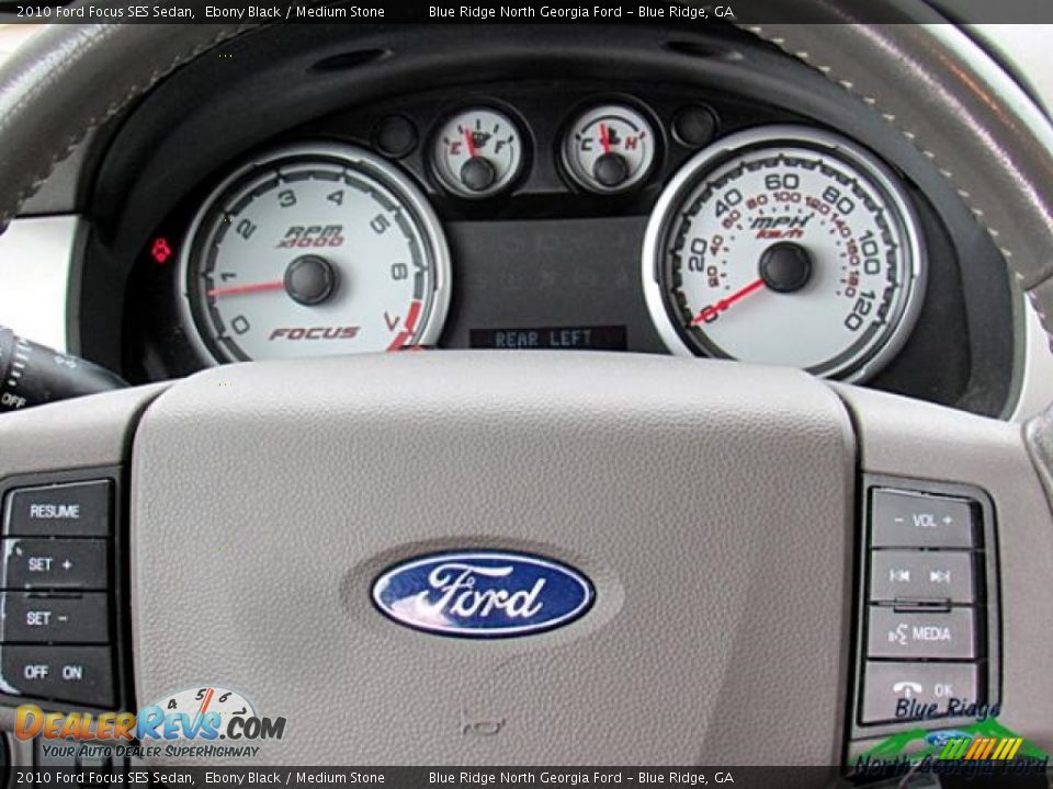 2010 Ford Focus SES Sedan Ebony Black / Medium Stone Photo #19