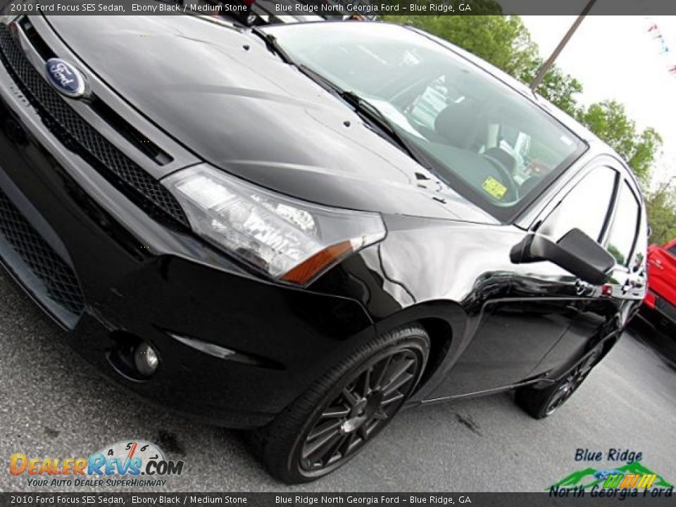 2010 Ford Focus SES Sedan Ebony Black / Medium Stone Photo #31
