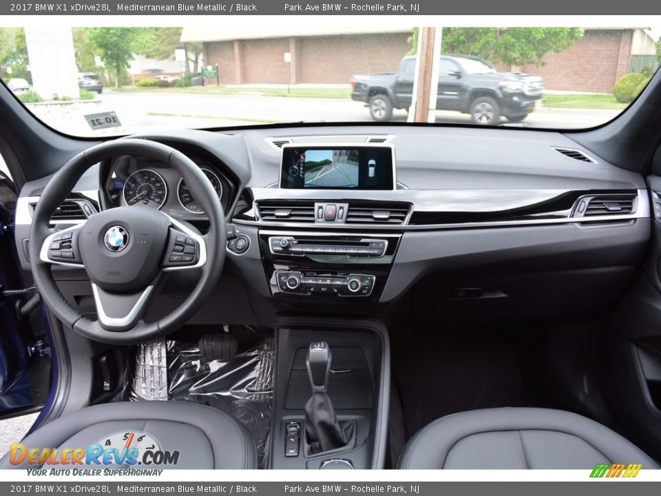Dashboard of 2017 BMW X1 xDrive28i Photo #15