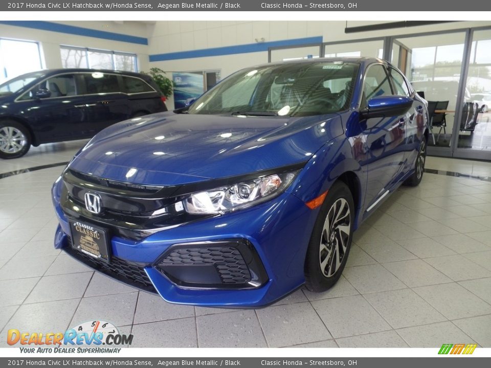 Front 3/4 View of 2017 Honda Civic LX Hatchback w/Honda Sense Photo #1