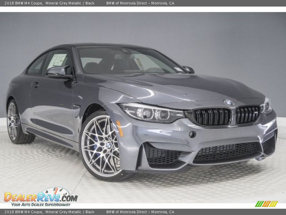 Front 3/4 View of 2018 BMW M4 Coupe Photo #12