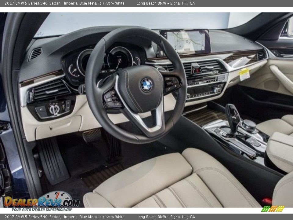 Dashboard of 2017 BMW 5 Series 540i Sedan Photo #6