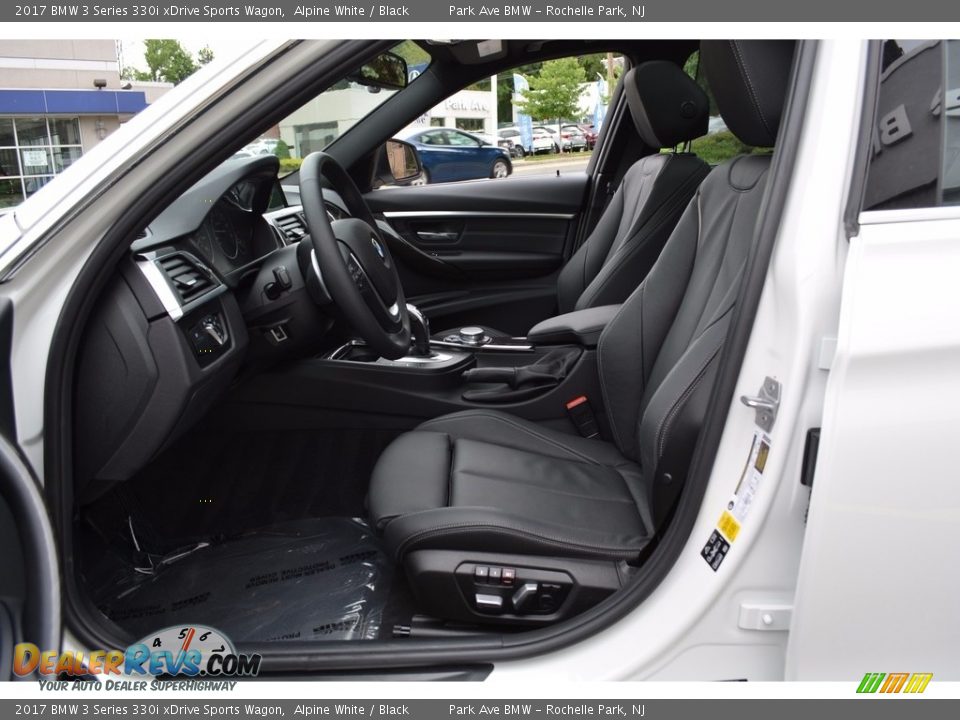 Front Seat of 2017 BMW 3 Series 330i xDrive Sports Wagon Photo #11