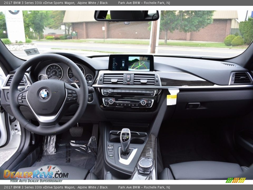 Dashboard of 2017 BMW 3 Series 330i xDrive Sports Wagon Photo #15