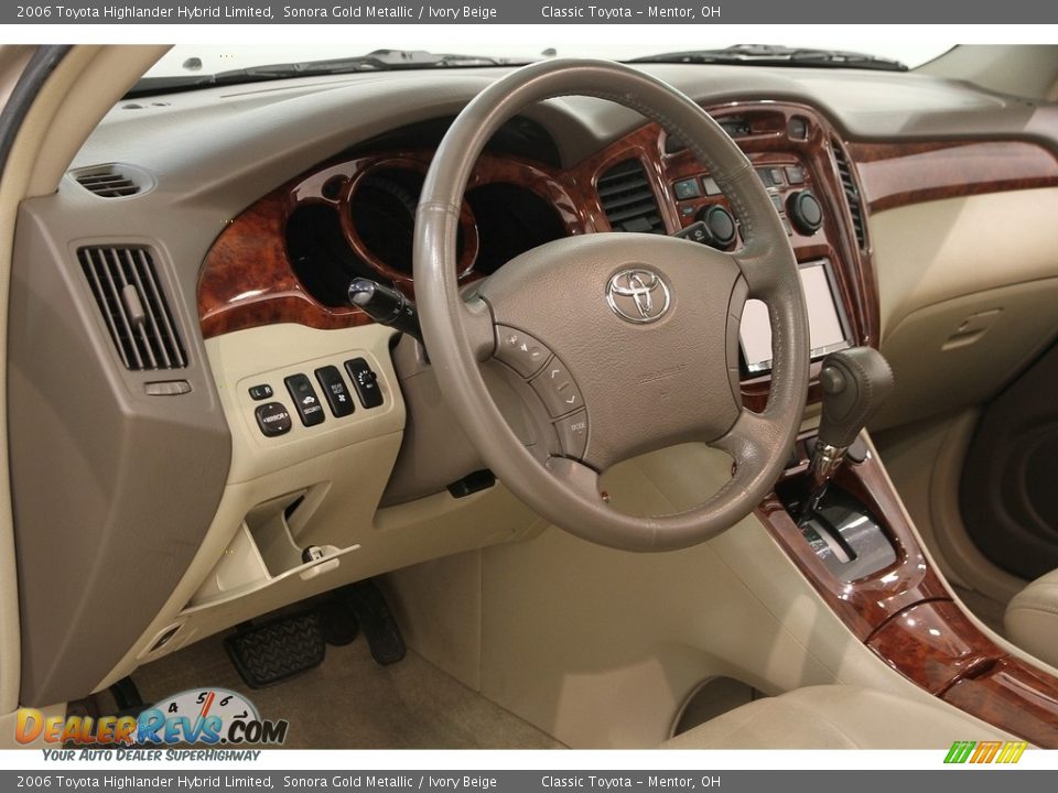 Dashboard of 2006 Toyota Highlander Hybrid Limited Photo #6