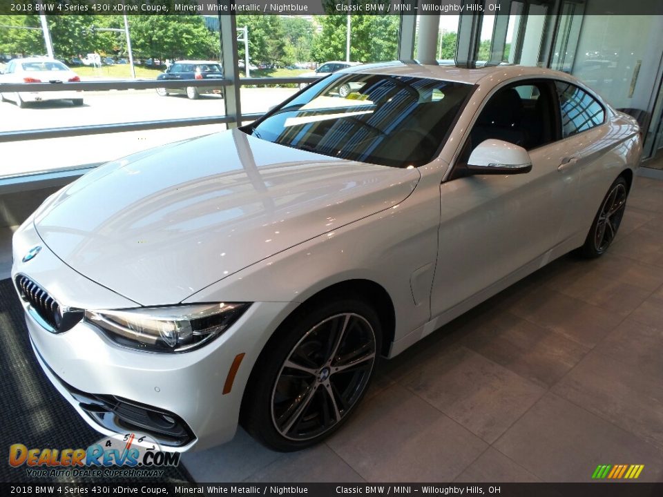 Front 3/4 View of 2018 BMW 4 Series 430i xDrive Coupe Photo #3