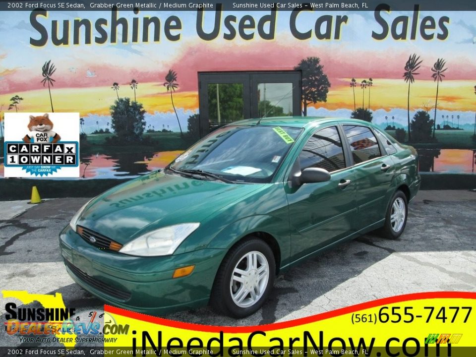2002 Ford Focus SE Sedan Grabber Green Metallic / Medium Graphite Photo #1