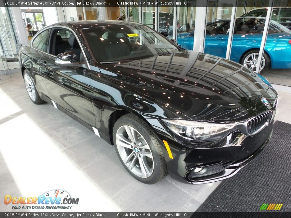 Front 3/4 View of 2018 BMW 4 Series 430i xDrive Coupe Photo #1
