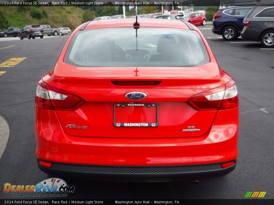 2014 Ford Focus SE Sedan Race Red / Medium Light Stone Photo #8