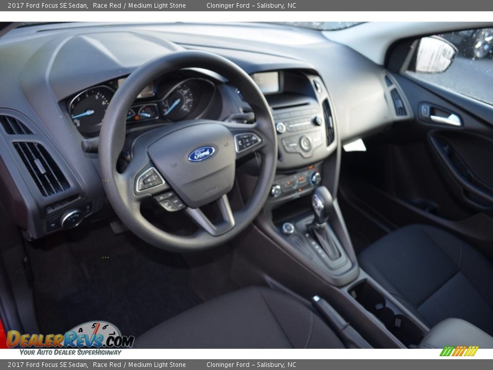 2017 Ford Focus SE Sedan Race Red / Medium Light Stone Photo #7