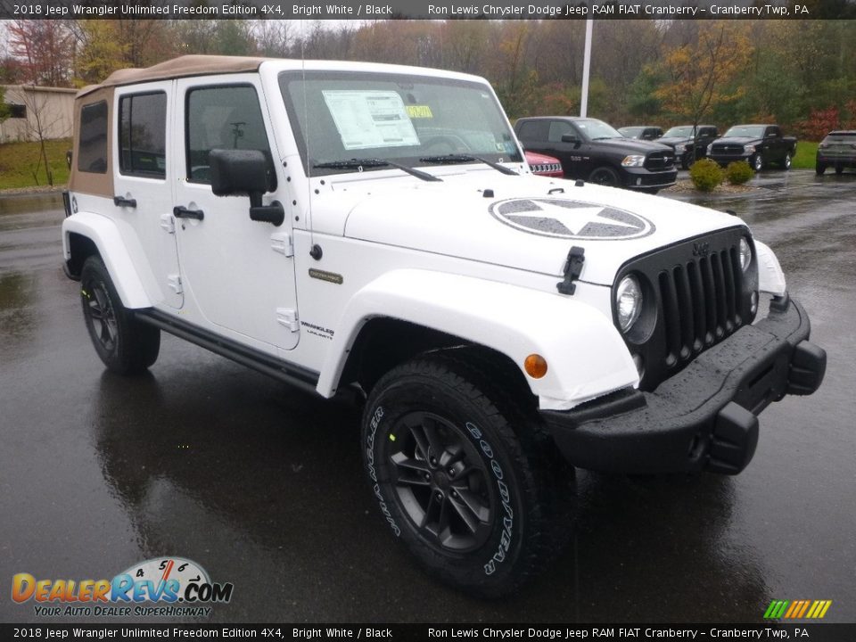 Front 3/4 View of 2018 Jeep Wrangler Unlimited Freedom Edition 4X4 Photo #7