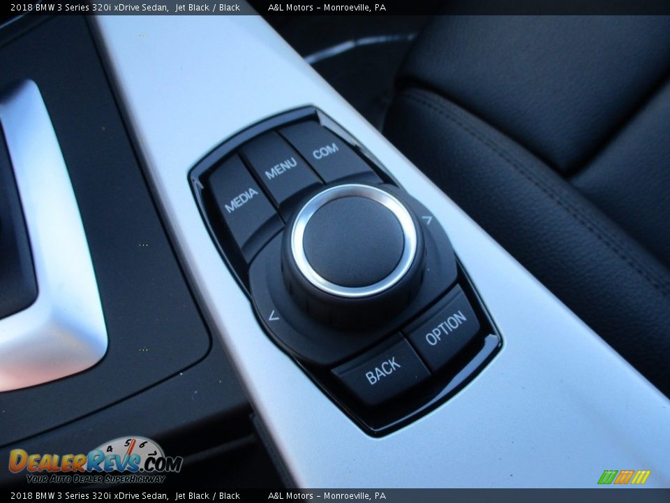 Controls of 2018 BMW 3 Series 320i xDrive Sedan Photo #18