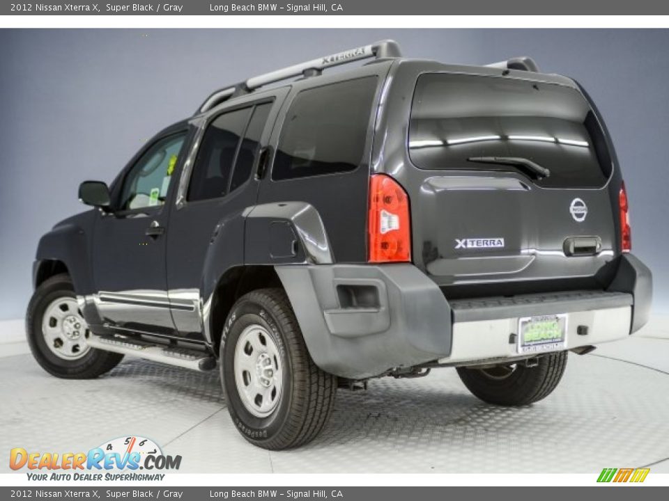 2012 Nissan Xterra X Super Black / Gray Photo #10