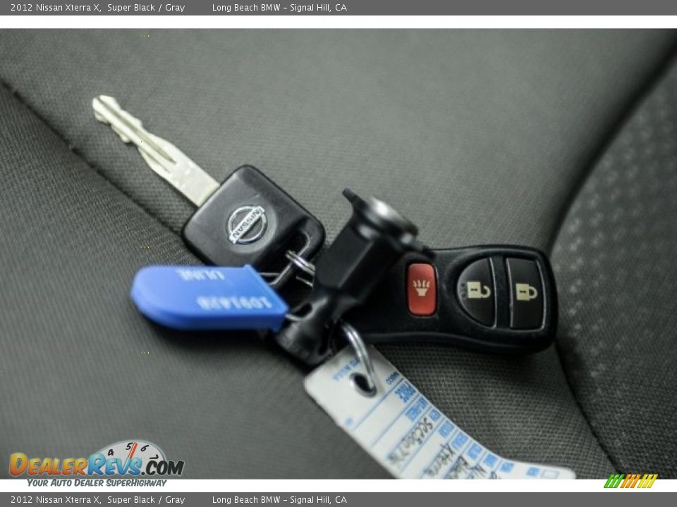 2012 Nissan Xterra X Super Black / Gray Photo #11