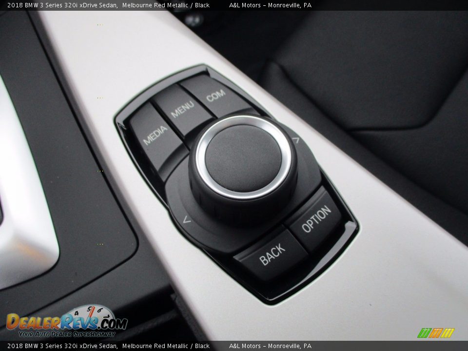 Controls of 2018 BMW 3 Series 320i xDrive Sedan Photo #17