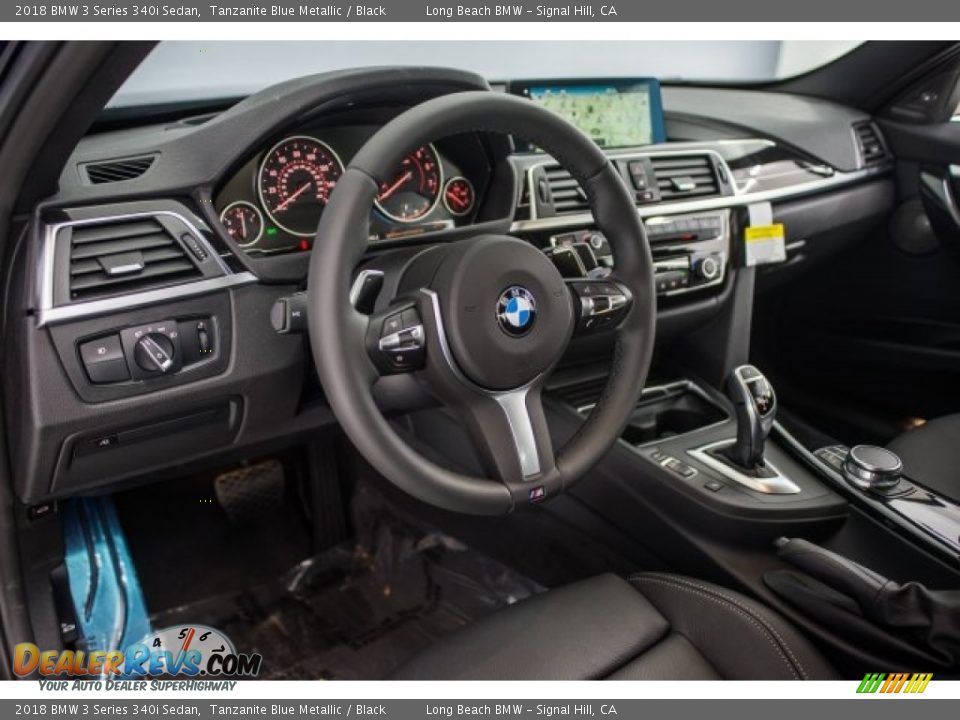 Dashboard of 2018 BMW 3 Series 340i Sedan Photo #6