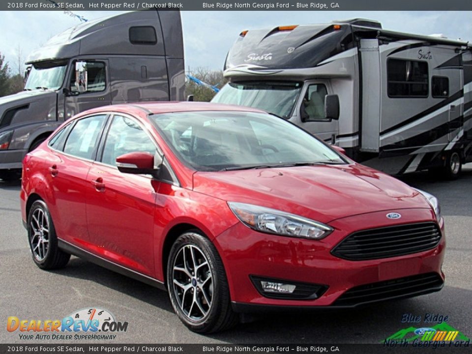 2018 Ford Focus SE Sedan Hot Pepper Red / Charcoal Black Photo #7