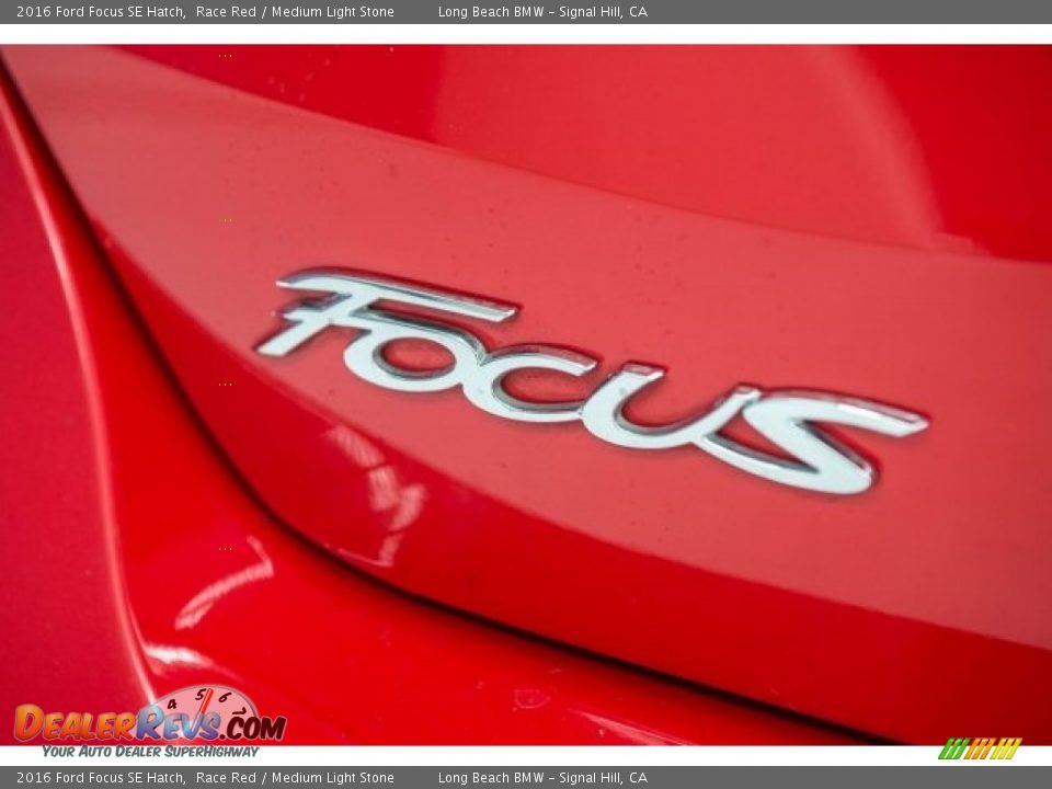 2016 Ford Focus SE Hatch Race Red / Medium Light Stone Photo #6