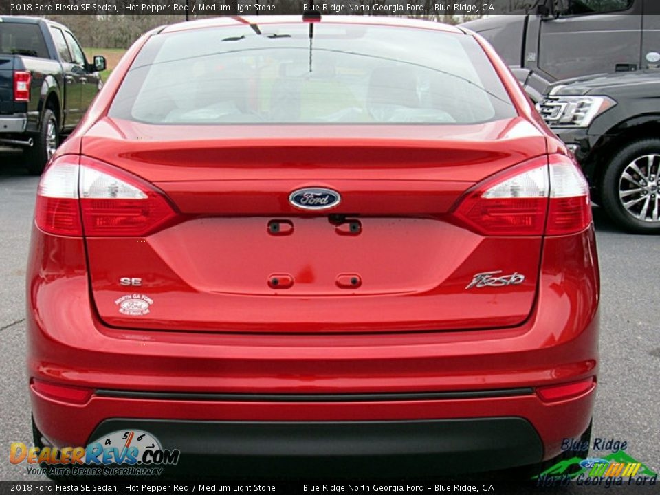 2018 Ford Fiesta SE Sedan Hot Pepper Red / Medium Light Stone Photo #4