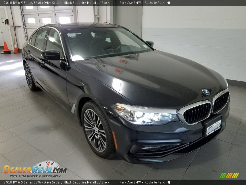 Front 3/4 View of 2018 BMW 5 Series 530i xDrive Sedan Photo #7