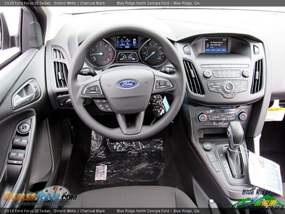 2018 Ford Focus SE Sedan Oxford White / Charcoal Black Photo #22
