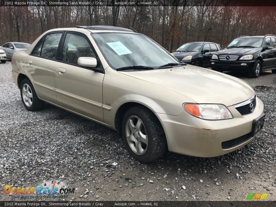 2002 Mazda Protege DX Shimmering Sand Metallic / Gray Photo #7