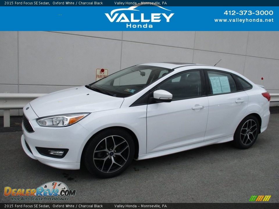 2015 Ford Focus SE Sedan Oxford White / Charcoal Black Photo #1